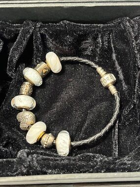 Pandora Black Leather Bracelet with 9 Accent Charms (7 Pandora Beads)
7.25”